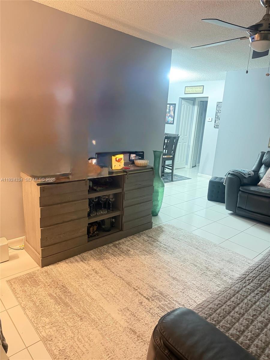 3001 Northwest 4th Terrace, Unit 158 Pompano Beach, FL 33064 - Photo 5 of 23 a view of room with wooden floor