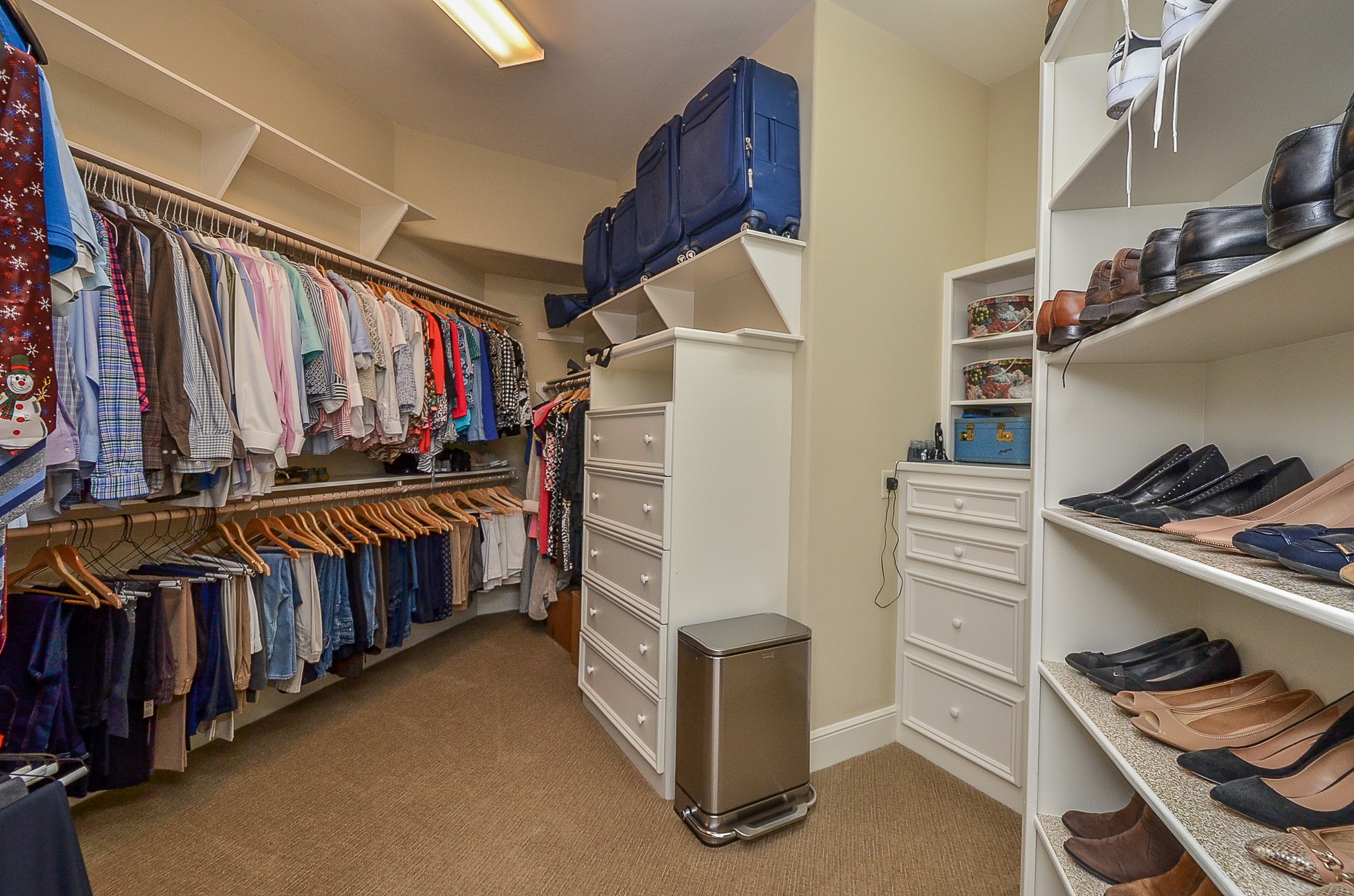12711 Waterside Way Houston, TX 77041 - Photo 28 of 48 Big walk-in closet with built-in cabinets.