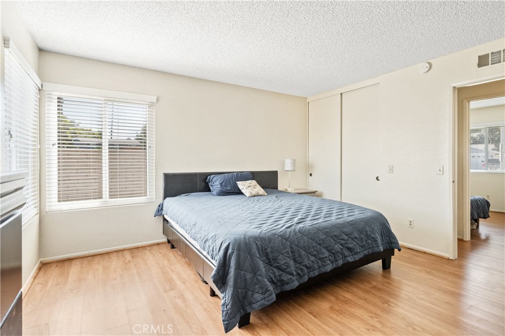 2111 Whitestone Drive Riverside, CA 92506 - Photo 10 of 17 a bedroom with a bed and a window