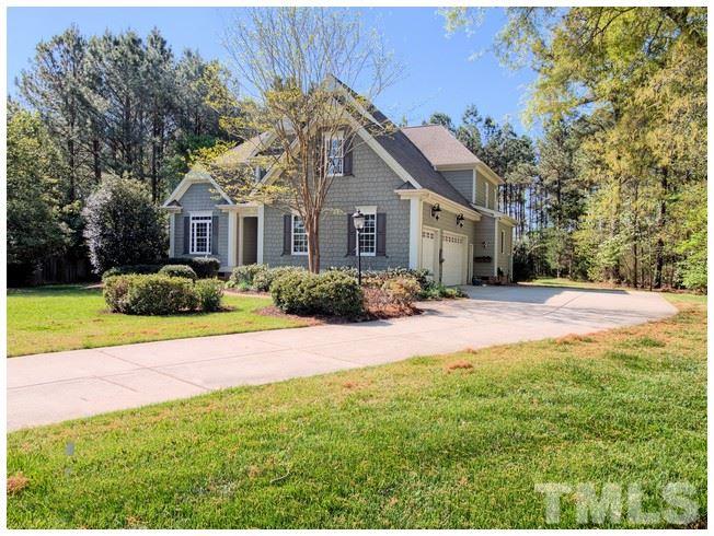 9709 Bailey Grove Court Raleigh, NC 27613 - Photo 3 of 25 a front view of a house with a garden