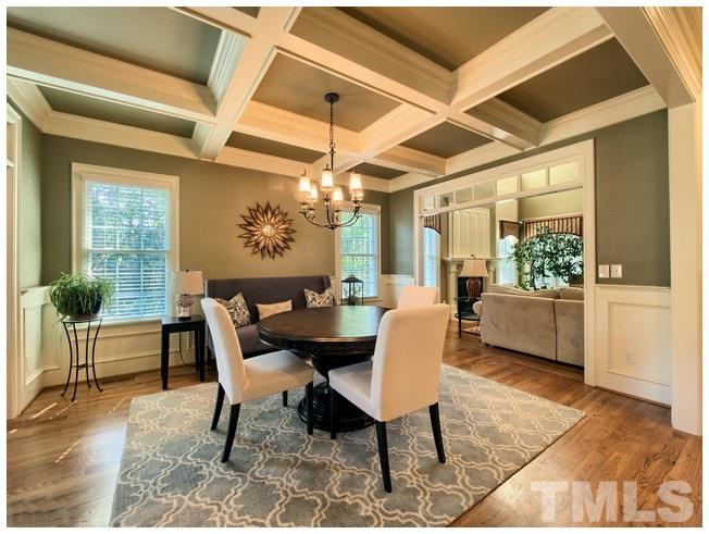 9709 Bailey Grove Court Raleigh, NC 27613 - Photo 8 of 25 a dining room with furniture and wooden floor