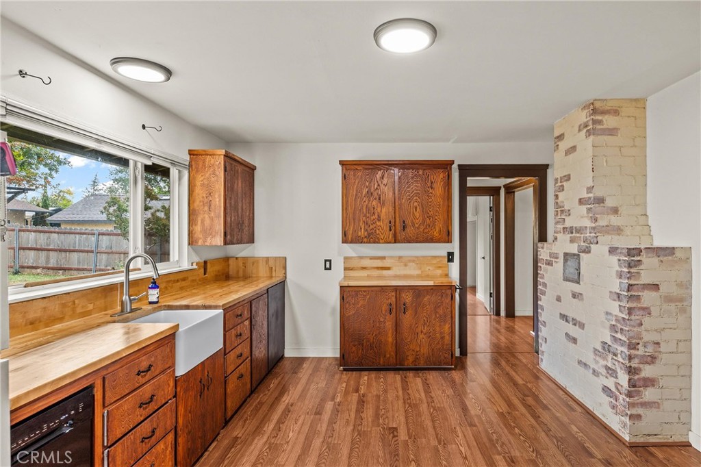 5416 Foster Road Paradise, CA 95969 - Photo 15 of 30 a kitchen with stainless steel appliances granite countertop a sink stove and refrigerator