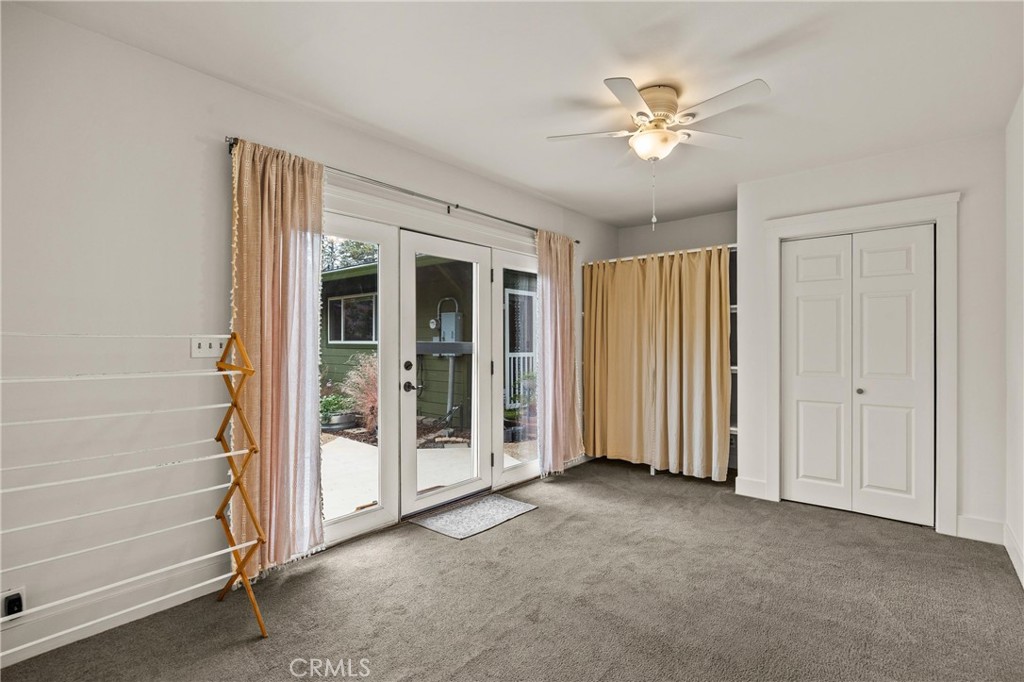 5416 Foster Road Paradise, CA 95969 - Photo 22 of 30 an empty room with closet and a ceiling fan