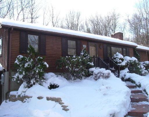 44 Blake Road Monroe, CT 06468 - Photo 1 of 1 a view of a backyard with a flower garden
