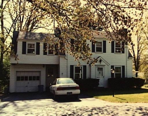 124 Booth Hill Road Trumbull, CT 06611 - Photo 1 of 1 a front view of a house with a yard