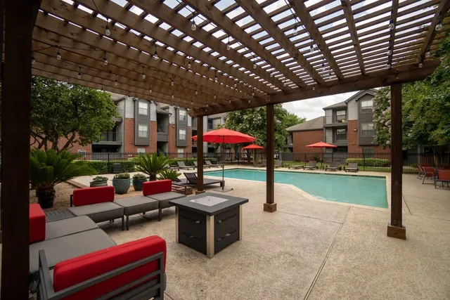 a view of a chairs in backyard of the house