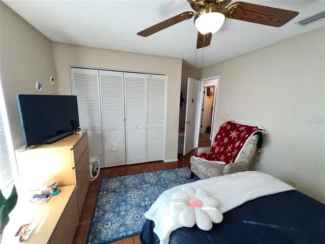 a bed room with a bed and a window