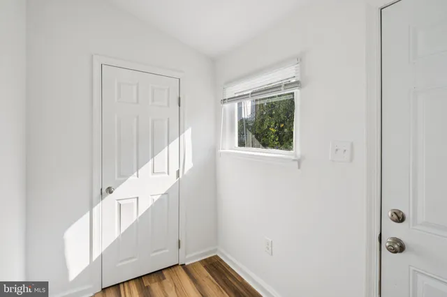 a view of a hallway with staircase