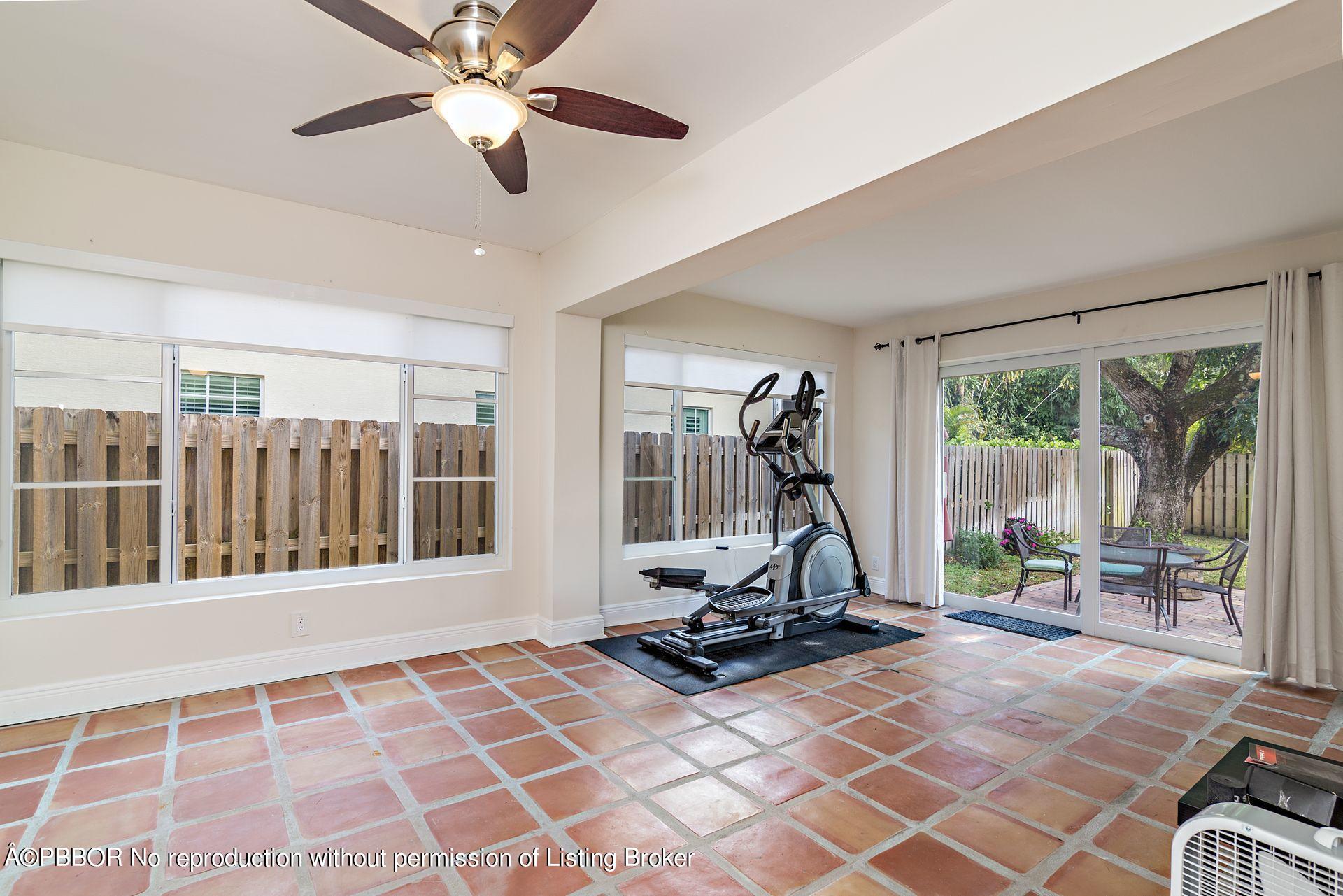 816 Sunset Road West Palm Beach, FL 33401 - Photo 11 of 22 a view of a room with gym equipment
