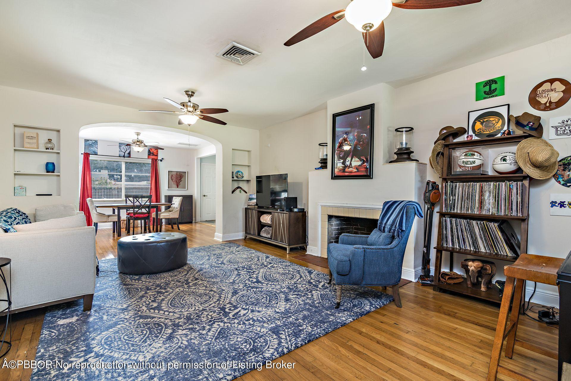 816 Sunset Road West Palm Beach, FL 33401 - Photo 4 of 22 a living room with furniture and a wooden floor