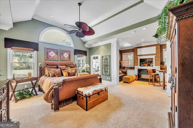 a view of an entryway with wooden floor and windows