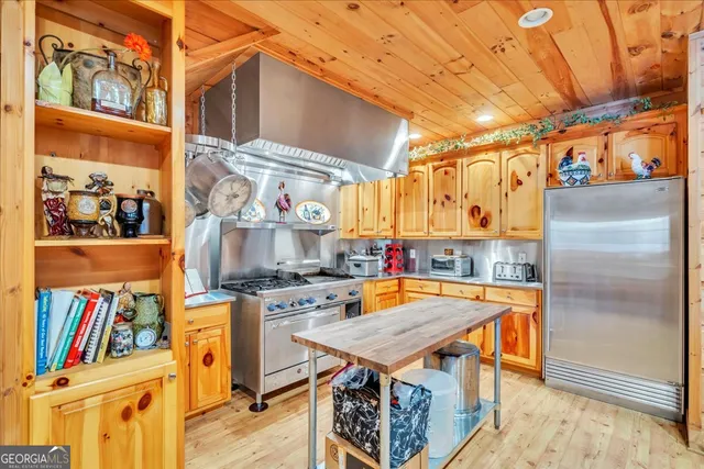 a view of a room with window and hardwood floor