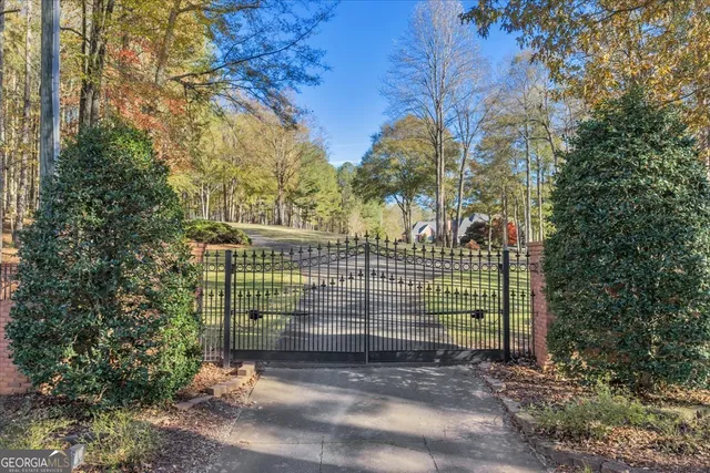 a kitchen with stainless steel appliances a sink stove and refrigerator