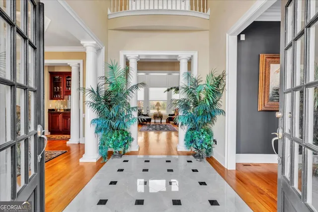 a very nice looking living room with a large window and stuff