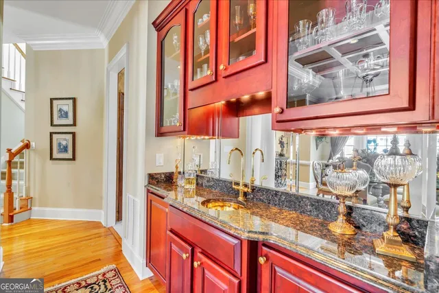 a spacious bathroom with a granite countertop tub and a sink