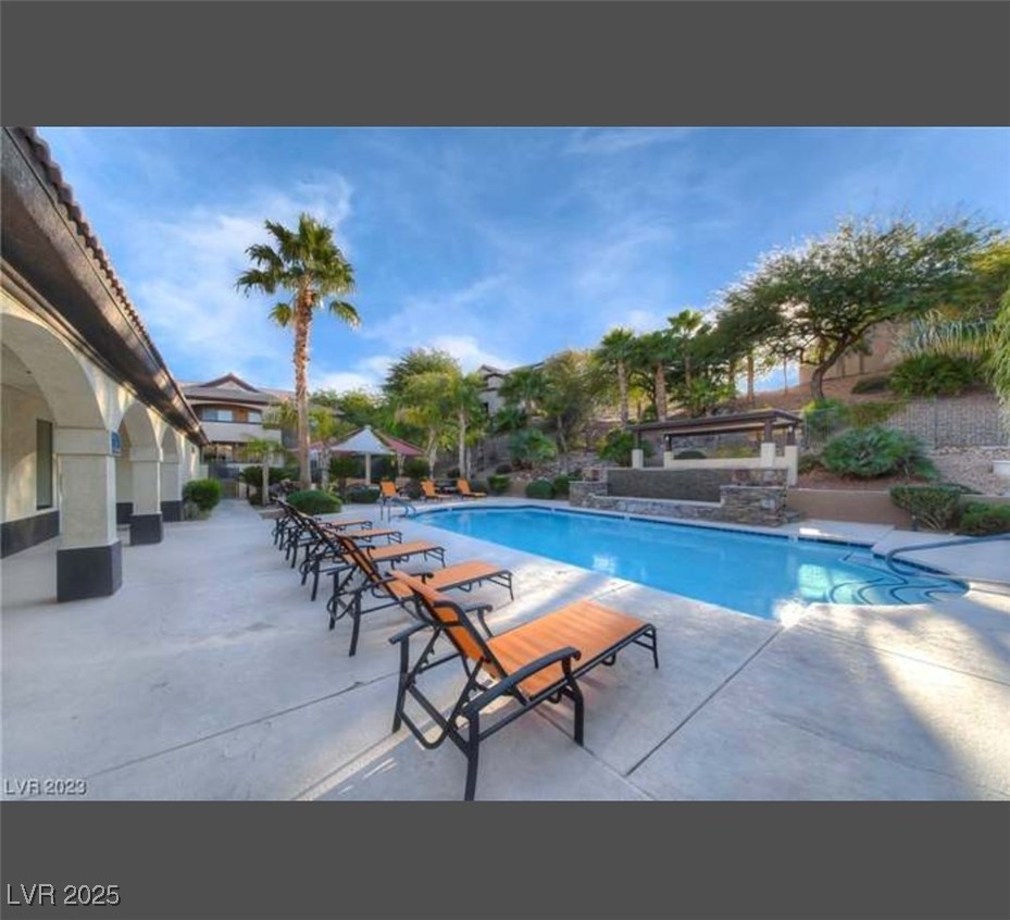 231 West Horizon Ridge Parkway, Unit 1126 Henderson, NV 89012 - Photo 27 of 33 Community pool featuring a patio area