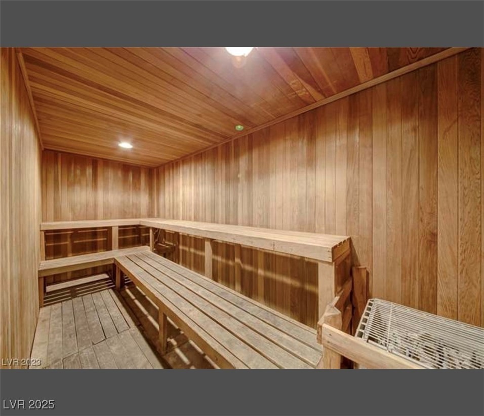 231 West Horizon Ridge Parkway, Unit 1126 Henderson, NV 89012 - Photo 31 of 33 Relaxing sauna with wood walls, wood ceiling, and wood finished floors