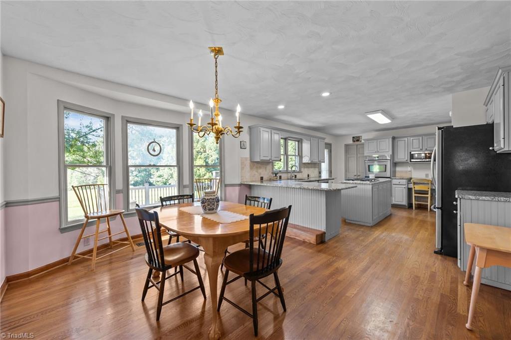 1498 Bethesda Road Lexington, NC 27295 - Photo 21 of 40 Light Filled Dining Room Overlooking Countryside Views