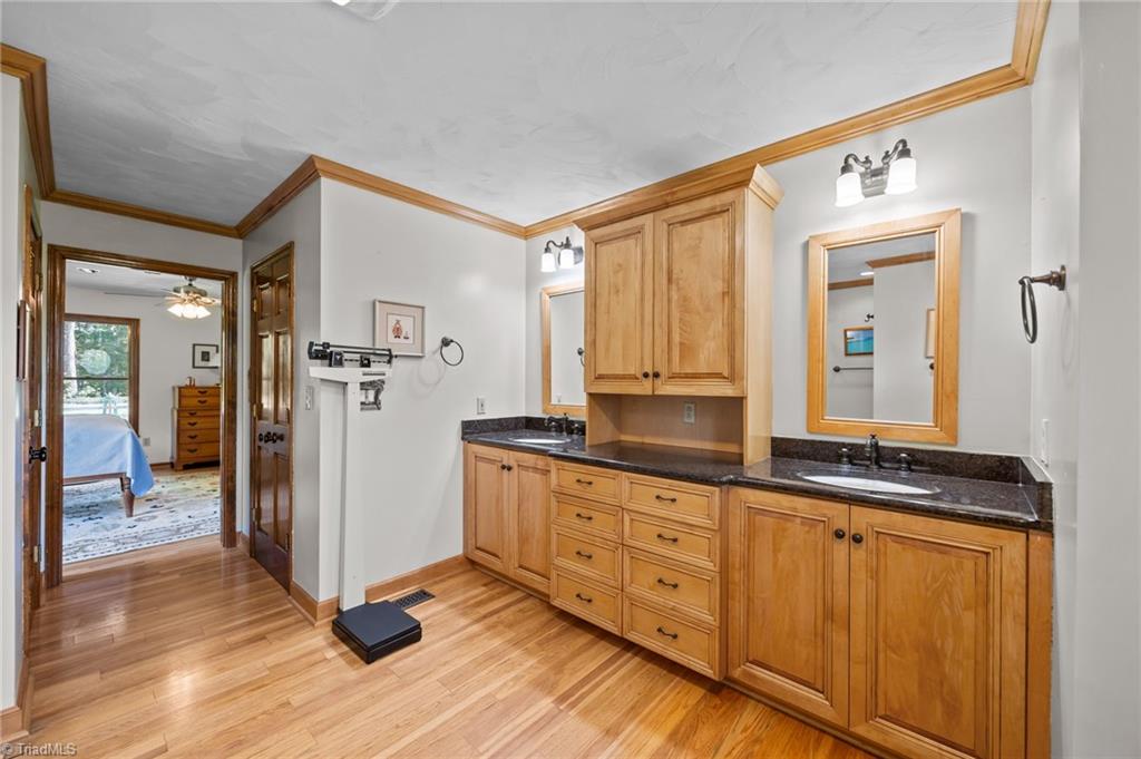 1498 Bethesda Road Lexington, NC 27295 - Photo 28 of 40 Spacious Primary En-Suite with Dual Vanities