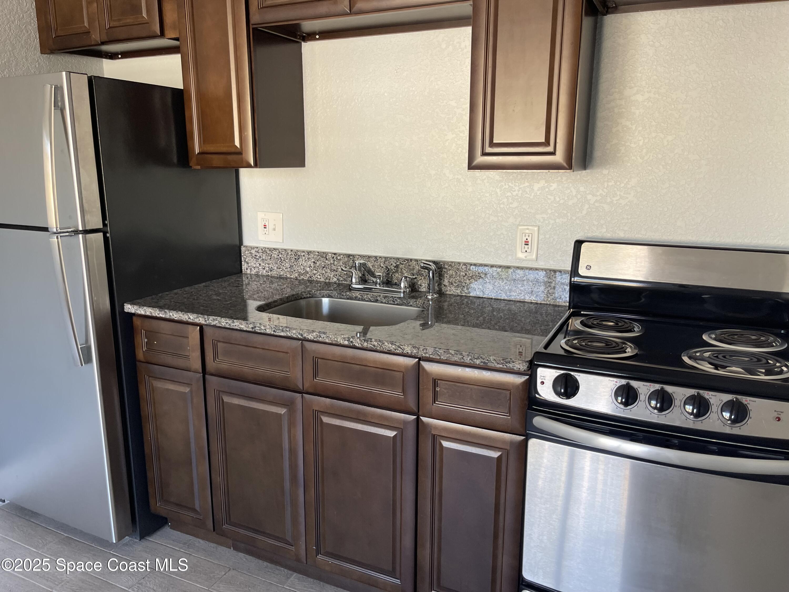 6100 Ridgewood Avenue, Unit 7 Cocoa Beach, FL 32931 - Photo 9 of 15 IMG_8666