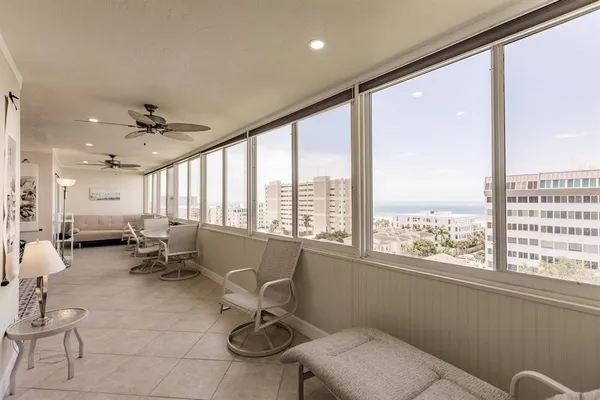 a very nice looking room with furniture and a large window