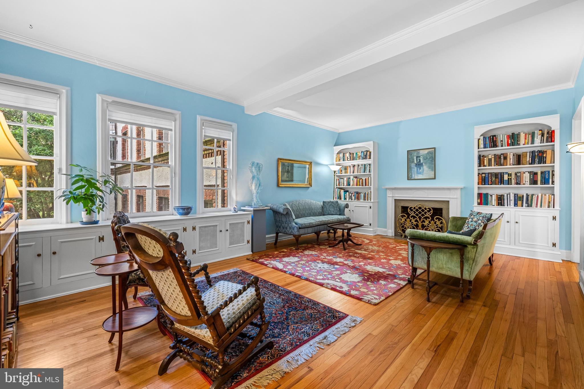 6 Upland Road, Unit F1 Baltimore, MD 21210 - Photo 9 of 50 a living room with furniture and a fireplace