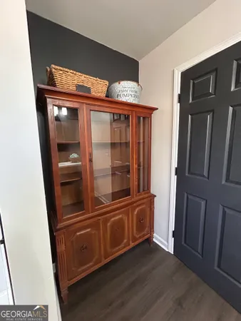 a view of an entryway with a door