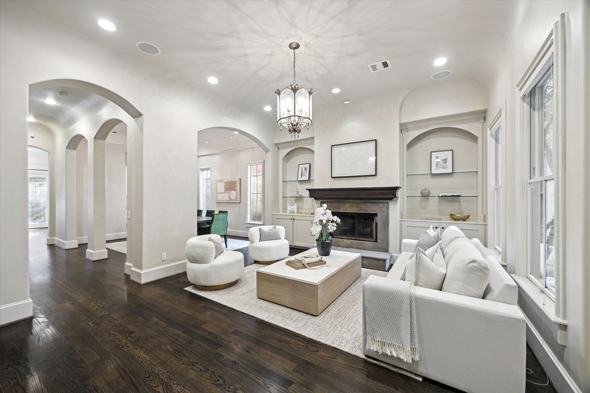 2145 Fairview Street Houston, TX 77019 - Photo 11 of 50 Sunning yet cozy Living space with Gas Log Fireplace, built ins and high ceilings.