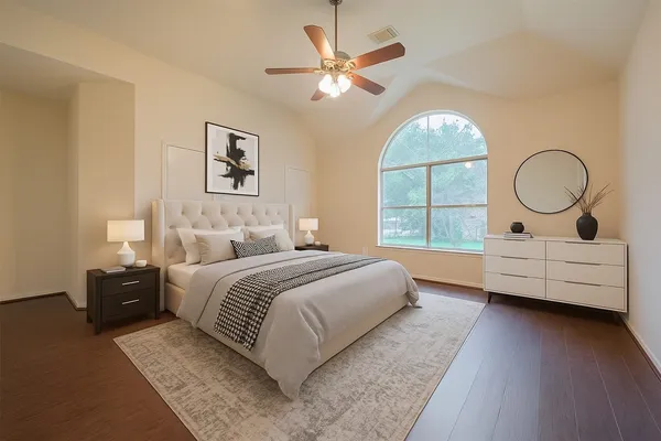 a bed room with bed and window