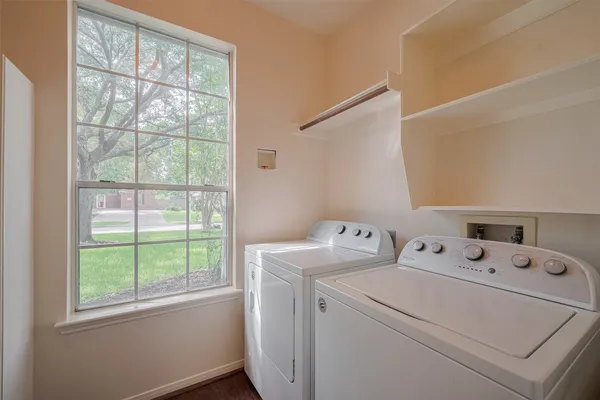 a utility room with dryer and washer