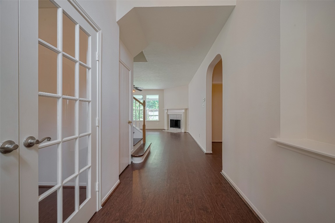 619 Bending Bough Drive Spring, TX 77388 - Photo 5 of 41 a view of hallway with wooden floor and windows
