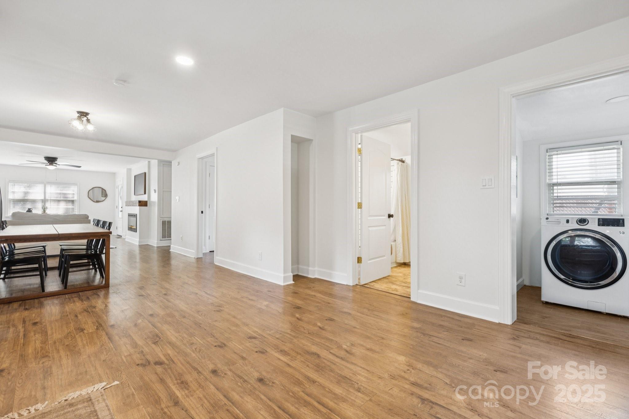 1225 Liberty Road Chester, SC 29706 - Photo 7 of 37 a view of a hallway with a stove and wooden floor