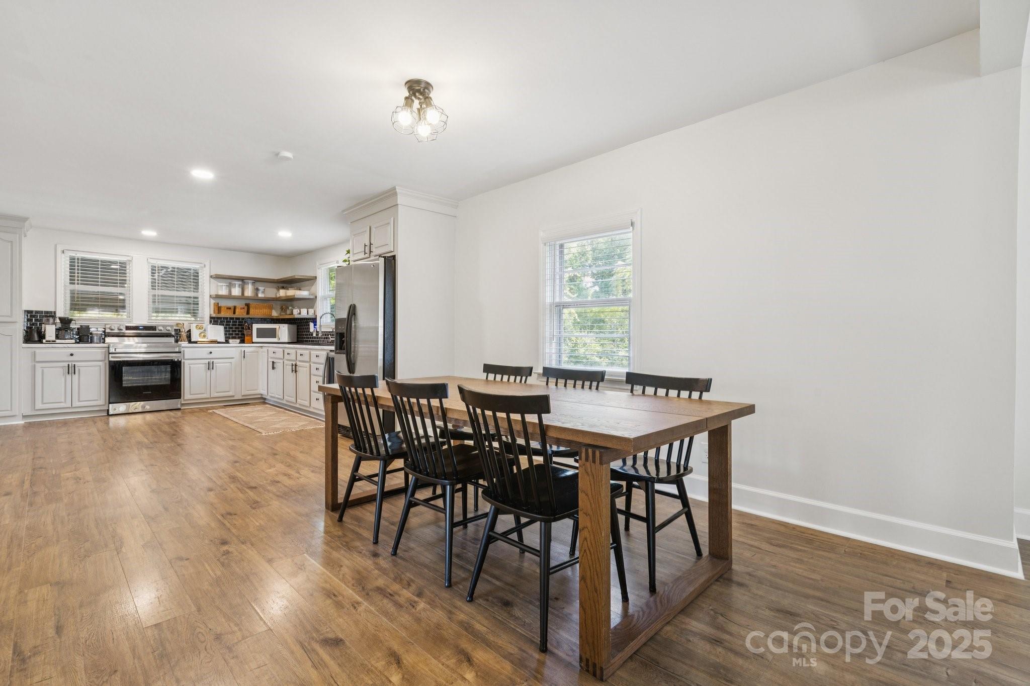 1225 Liberty Road Chester, SC 29706 - Photo 10 of 37 a view of a dining room with furniture and a kitchen