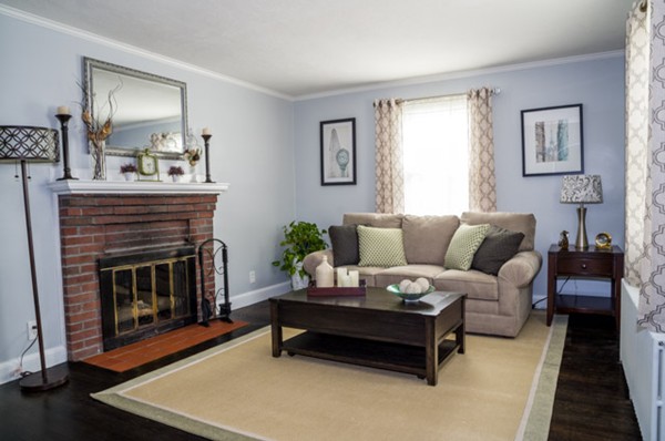 11 Charlotte Road Walpole, MA 02032 - Photo 4 of 30 a living room with furniture and a fireplace