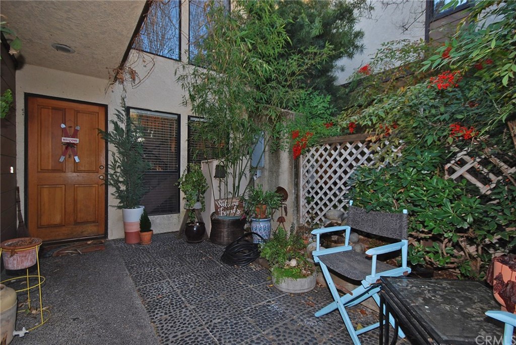 Two story condo offering private courtyard entry.