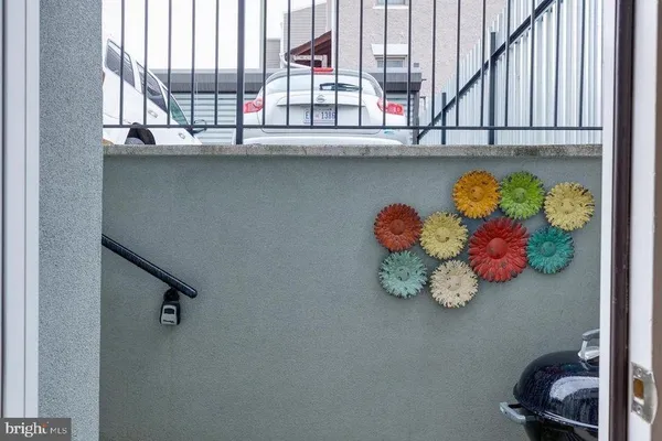 a view of a balcony with chairs