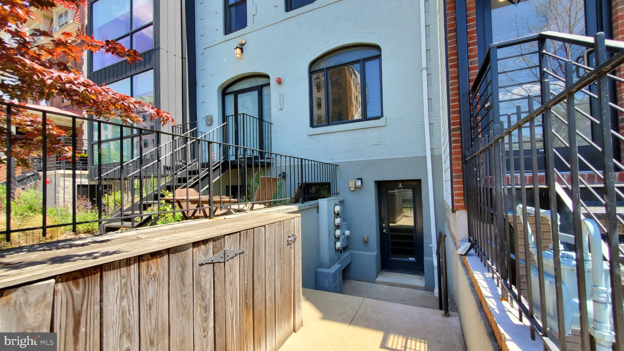 3465 14th Street Northwest, Unit A Washington, DC 20010 - Photo 3 of 28 a view of a brick house with a large windows