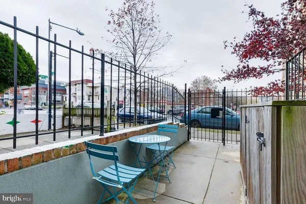 a balcony with chairs