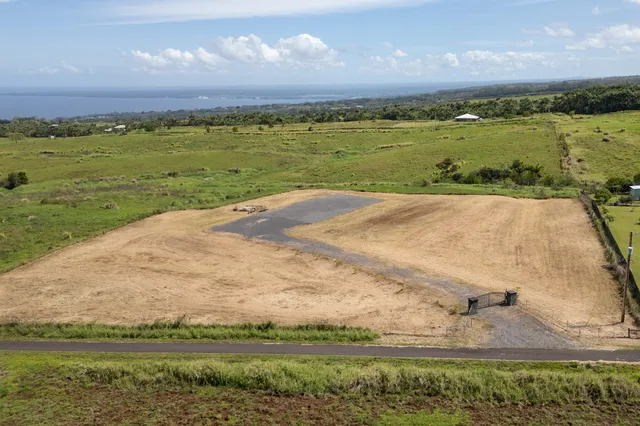 a view of a lake with a city