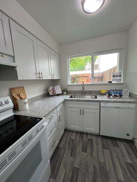 41016 Cornac Terrace Fremont, CA 94539 - Photo 23 of 24 a kitchen with granite countertop cabinets stainless steel appliances a sink and a window