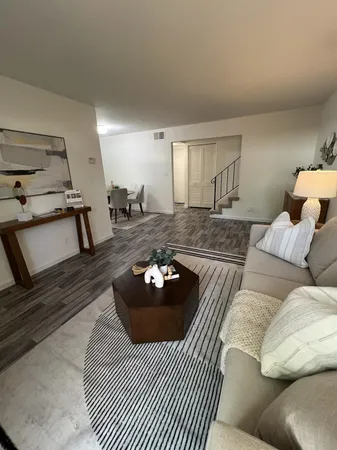 a living room with furniture and a couch