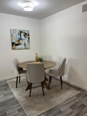 a view of a workspace with furniture