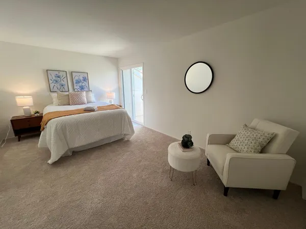 a bed room with bed and a couch
