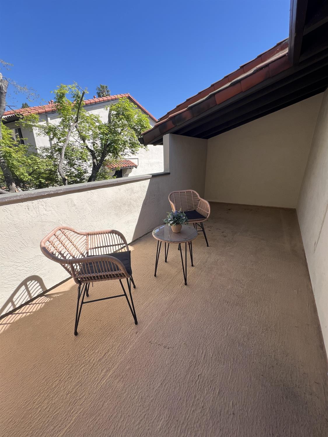 41016 Cornac Terrace Fremont, CA 94539 - Photo 8 of 24 a view of patio with table and chairs and potted plants