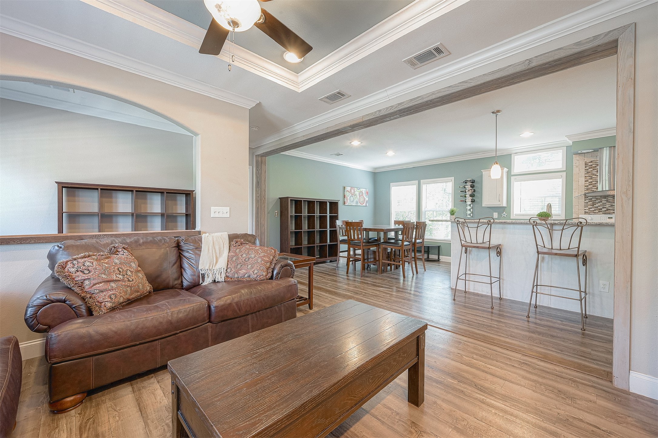 20547 South Post Oak Boulevard, Unit B Fresno, TX 77545 - Photo 14 of 46 a living room with furniture and wooden floor