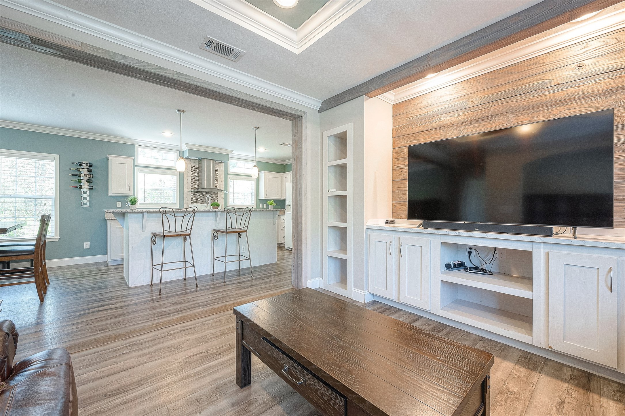 20547 South Post Oak Boulevard, Unit B Fresno, TX 77545 - Photo 15 of 46 a living room with furniture and flat screen tv
