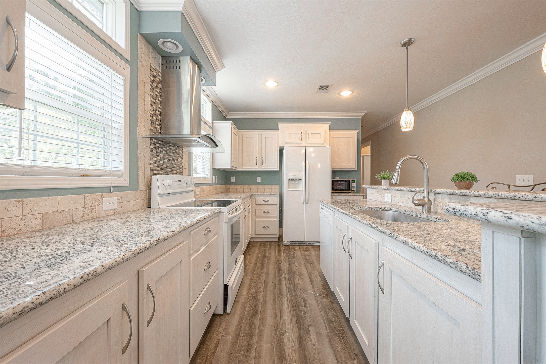 20547 South Post Oak Boulevard, Unit B Fresno, TX 77545 - Photo 26 of 46 a large kitchen with granite countertop a sink and a window