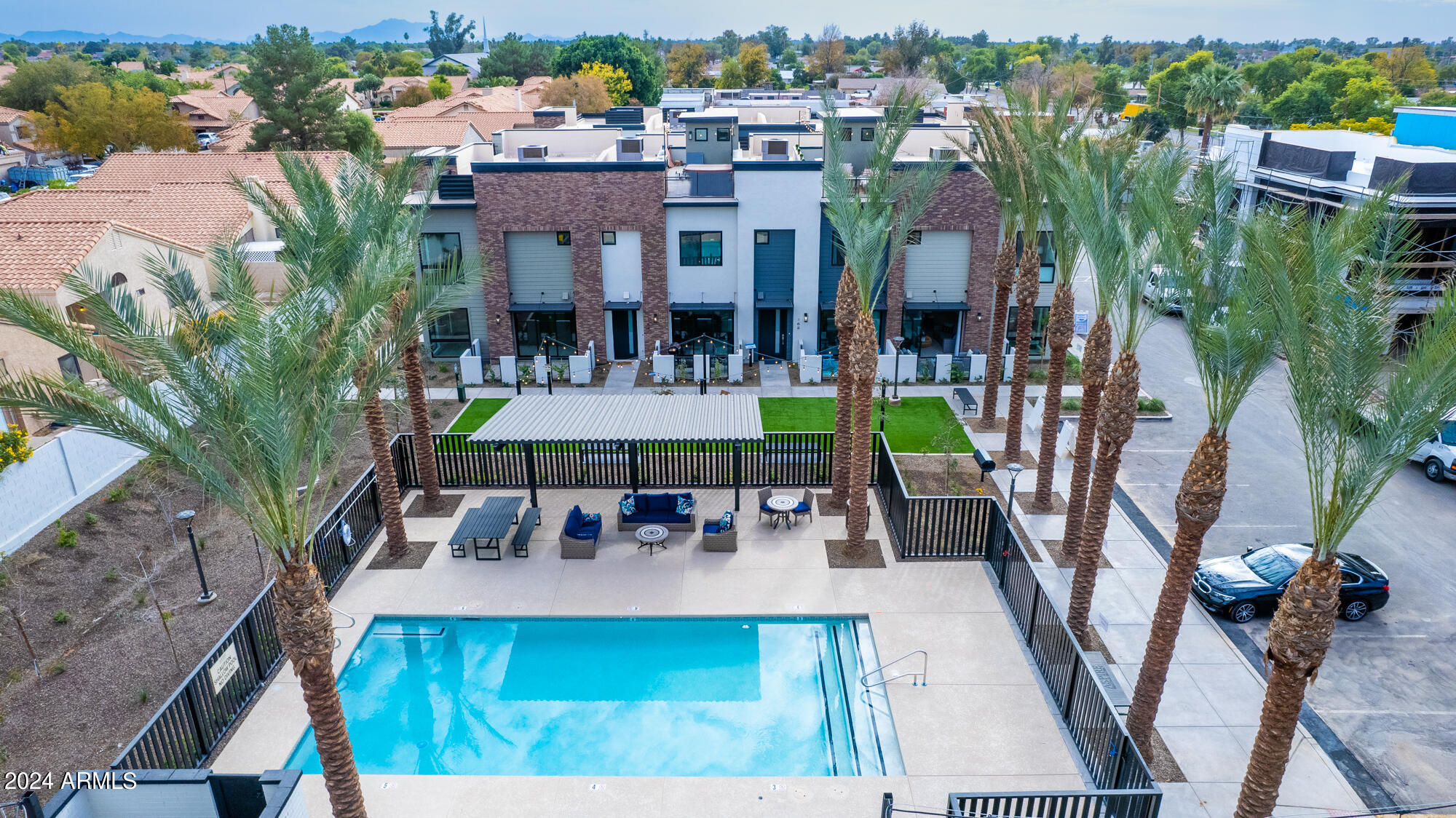 142 East Hearne Way Gilbert, AZ 85234 - Photo 27 of 44 an aerial view of multiple houses with yard