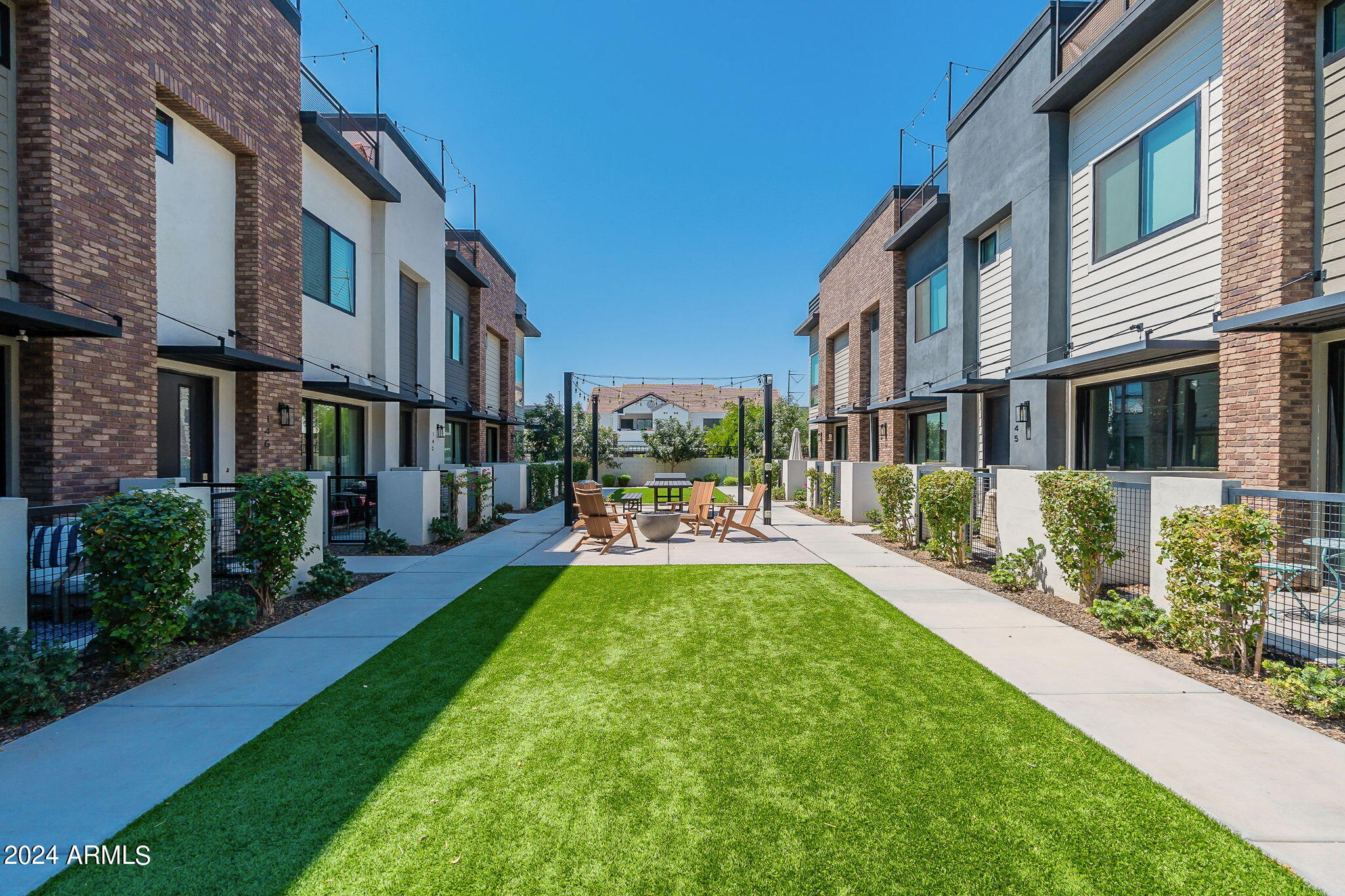 142 East Hearne Way Gilbert, AZ 85234 - Photo 32 of 44 a view of a building with a yard