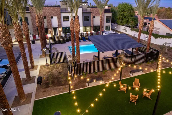 a view of an outdoor space pool patio and outdoor seating